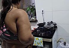 Chubby stepmother with big tits fucked by stepson in kitchen
