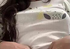 Shemale puts hair clamp on her cock while masturbating in this solo session