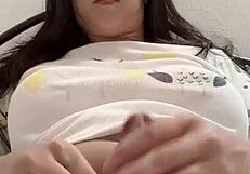 Shemale puts hair clamp on her cock while masturbating in this solo session