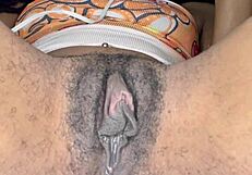 horny slut edges her ebony hairy pussy