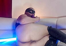 Wife in high boots enjoys toy play intensely