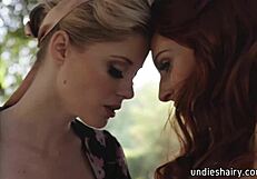 Sensual redhead lesbian seduced by blonde friend gets bush licked outdoors charlotte stokely maya kendrick