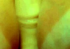 brunette engaging in extreme teasing with tits and butt plug