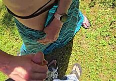 Wife gives quick handjob during outdoor walk