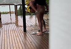 Is this shameless young wife getting fucked on the porch by her husband?