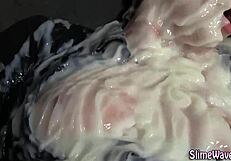 Slime-covered babe receives messy facial cumshot