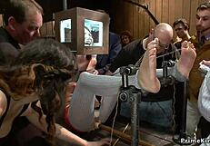 Redhead and blonde subs feel humiliated during public banging in bondage