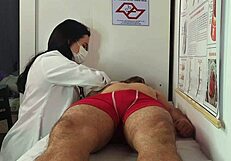 Nurse and Aesthetician Observe Patient's Erection