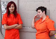 Raunchy lez prison guard teases redheaded prisoner for vigorous banging