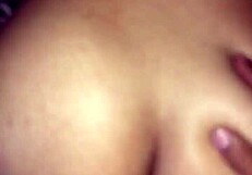 the wet pussy glistens under the lights