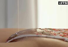 Big oiled ass teen Katarina Rina intensely spreads tight pussy during massage session.