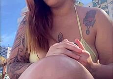 African woman feels excitement flashing on beach