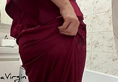 in the bathroom, a brunette milf masturbates passionately under the shower, reaching orgasm with wet pussy