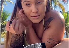 African woman feels excitement flashing on beach