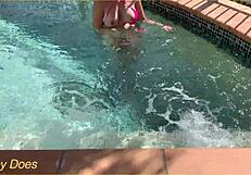 Wife flashes her big tits in the hotel pool for exhibitionist fun.