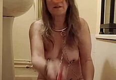 slave endures flagellation in bdsm session