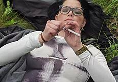 smoking on the grass and showing my boobs?