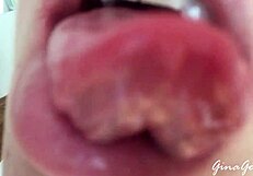 A young skinny blonde amateur explores homemade tongue and saliva techniques with a teen friend in a casual setting