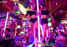 Twin girlfriends get fucked hard in the public bathroom after stripping.