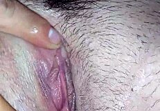 Amateur wife receives a cameltoe massage from her husband.