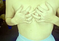 Sexy horny milf fingers and fucks herself in the gym