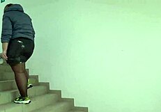 public foot fetish features fat legs in nylon on mall stairs under skirt