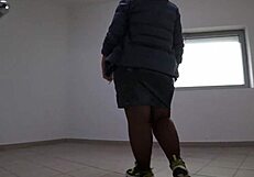 public foot fetish features fat legs in nylon on mall stairs under skirt