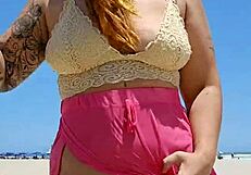 Beach lover flashes pussy to make him hard.