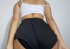 Sexy big-ass girl touches herself in front of camera.