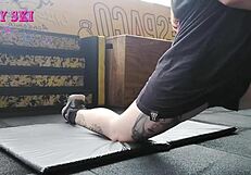 Alternative girl stretching at the gym?