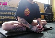 Alternative girl stretching at the gym?