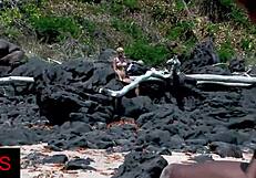 Amazing Girl Fucks With A Black Man On The Beach While Another One Watches.