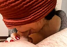 licking his lollipop for sweet reward