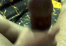 Intense handjob session on a massive big black cock