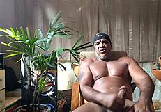 pornstar brasil brazilian bear kojac indulges in solo masturbation, stroking his huge hairy cock