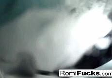 Romi enjoys lesbian fun with big tits