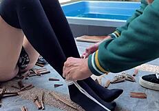 Pretty college brunette in stockings tied tight moans from outdoor rope tickle torment