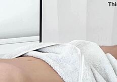 Close-up oiled massage handjob ends with huge cumshot pov