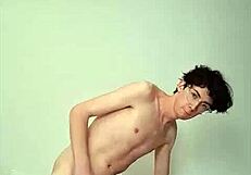 Skinny teen strokes monster cock horny on sunny bed