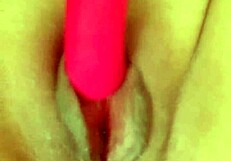 me stuffing dildo deep in my pussy lips while flexing muscles!!