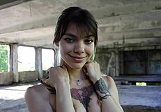 sexiest fitness athlete stretches flexible body outdoors in public close up hairy sport