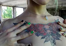 sexiest fitness athlete stretches flexible body outdoors in public close up hairy sport