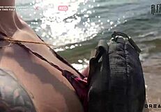 pervert shows tits on beach then fucks on rocks