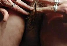 granny teases her hairy old pussy with a thick cucumber insertion