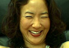 cute asian babe kneels down eagerly licking and sucking hard cock close up