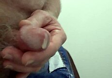 rustyas1 strokes small cock desperately in public toilet stall