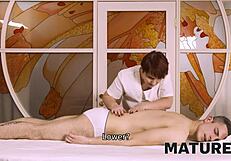 mature redhead's pussy subtly grinds against macho in erotic massage parlor