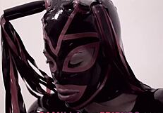 check this shemale in latex pounding her boy hard