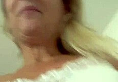 blonde shows off big shaved pussy lips up close in homemade vid
