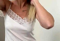 blonde shows off big shaved pussy lips up close in homemade vid